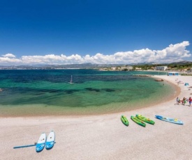 T2 proche mer, jacuzzi spa, jardin et parking privé